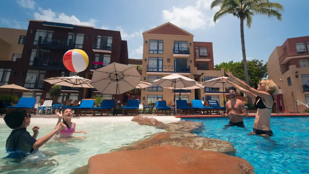 El Cid Marina Beach Hotel_family playing with beach ball in the pool