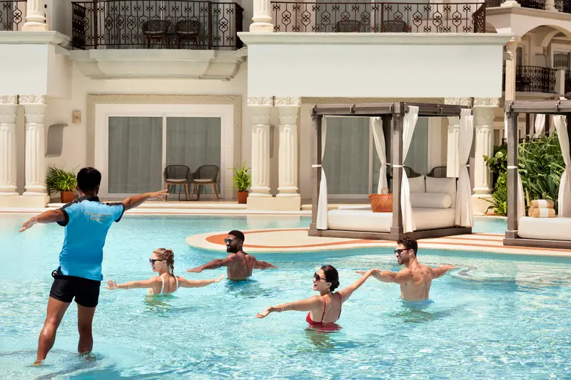 Hilton Playa del Carmen pool activity with couples